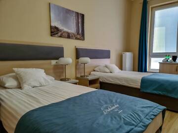 Фото номера Улучшенный трехместный номер Отель Hotel Antonińska г. Лешно 3