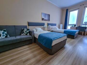 Фото номера Улучшенный трехместный номер Отель Hotel Antonińska г. Лешно 5