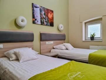 Фото номера Улучшенный двухместный номер с 1 кроватью Отель Hotel Antonińska г. Лешно 2