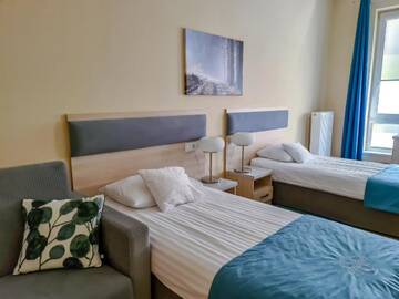 Фото номера Улучшенный трехместный номер Отель Hotel Antonińska г. Лешно 9