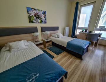 Фото номера Улучшенный трехместный номер Отель Hotel Antonińska г. Лешно 6