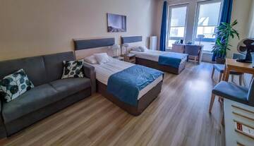 Фото номера Улучшенный трехместный номер Отель Hotel Antonińska г. Лешно 11