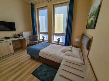 Фото номера Улучшенный одноместный номер Отель Hotel Antonińska г. Лешно 7