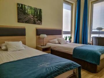 Фото номера Улучшенный двухместный номер с 1 кроватью Отель Hotel Antonińska г. Лешно 7